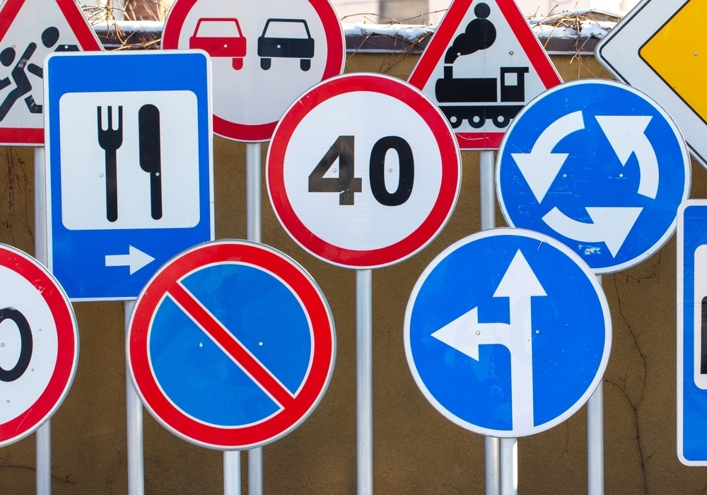 Different,Road,Signs,As,A,Background.